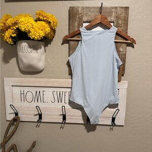 Skims fits everybody high neck bodysuit in color opal